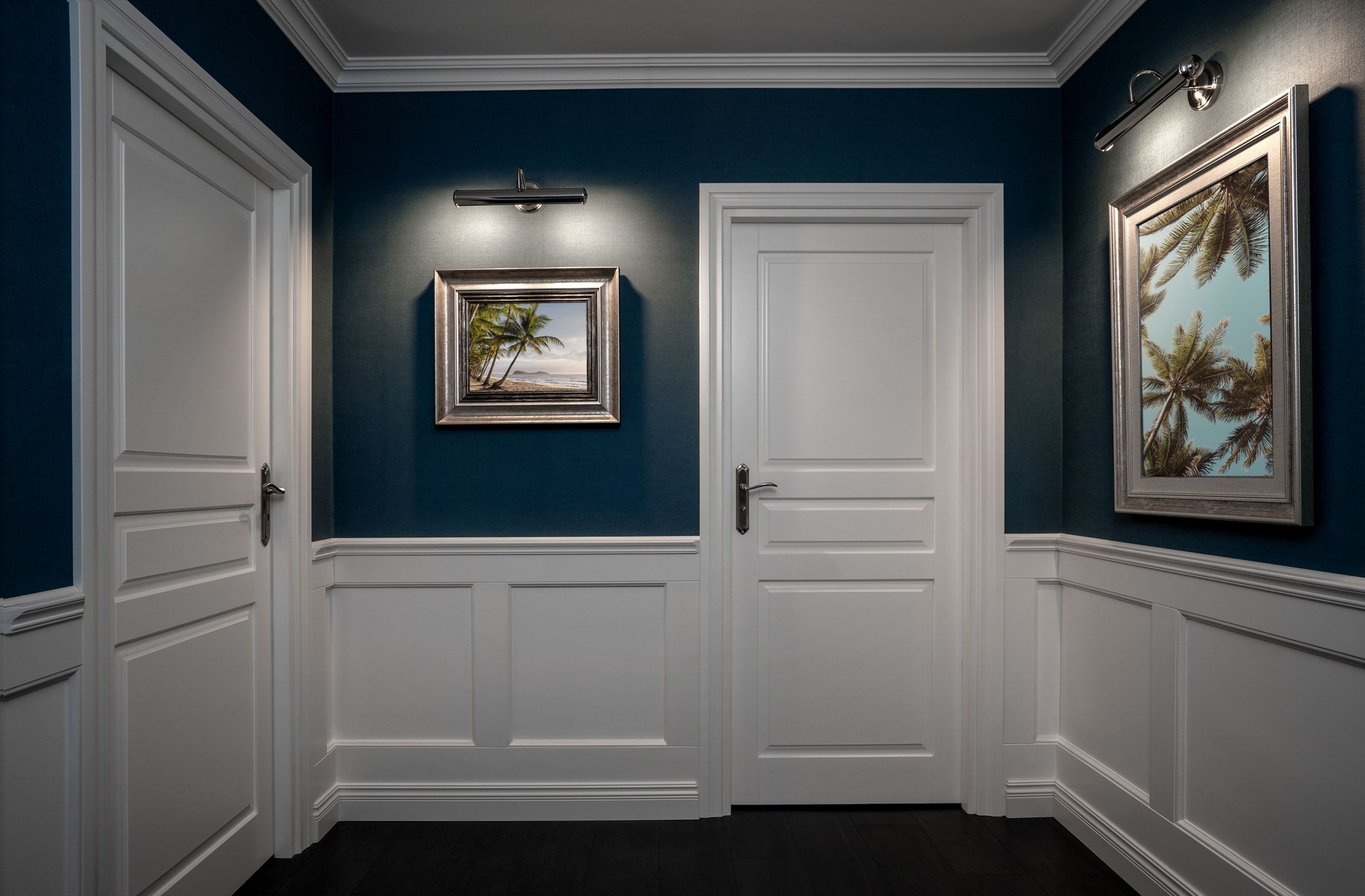 Empty elegant hallway. Dark but elegant fresh coat of paint, crisp white trim. Rejuvenation Renovations.